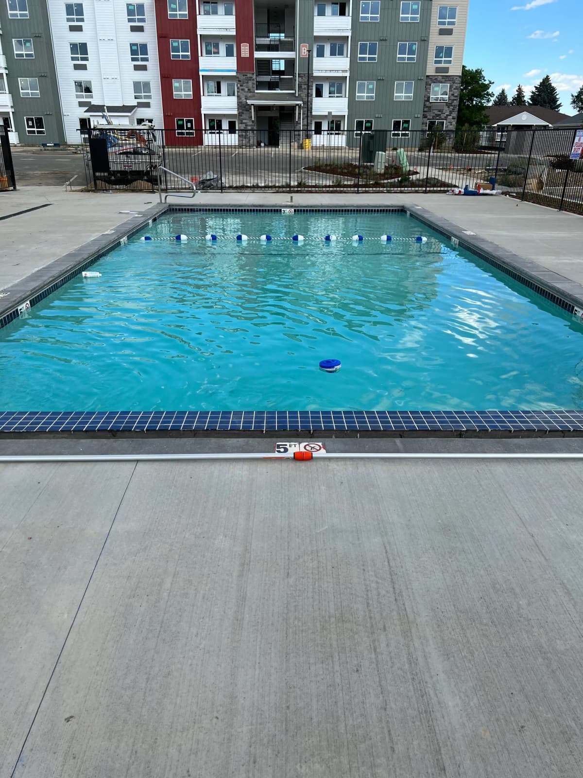 commercial outdoor resort swimming pool deck