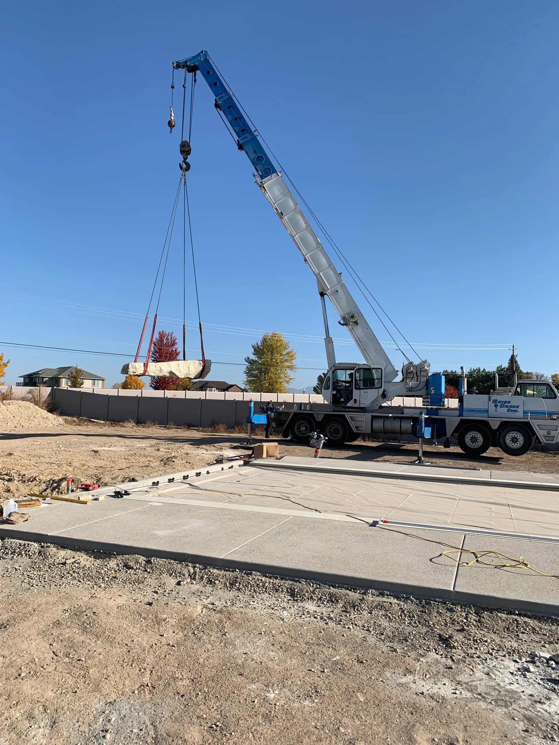 crane pool construction remote mountain island location boise idaho hdt custom pool builders boise — HDT Custom Pool Builders Boise