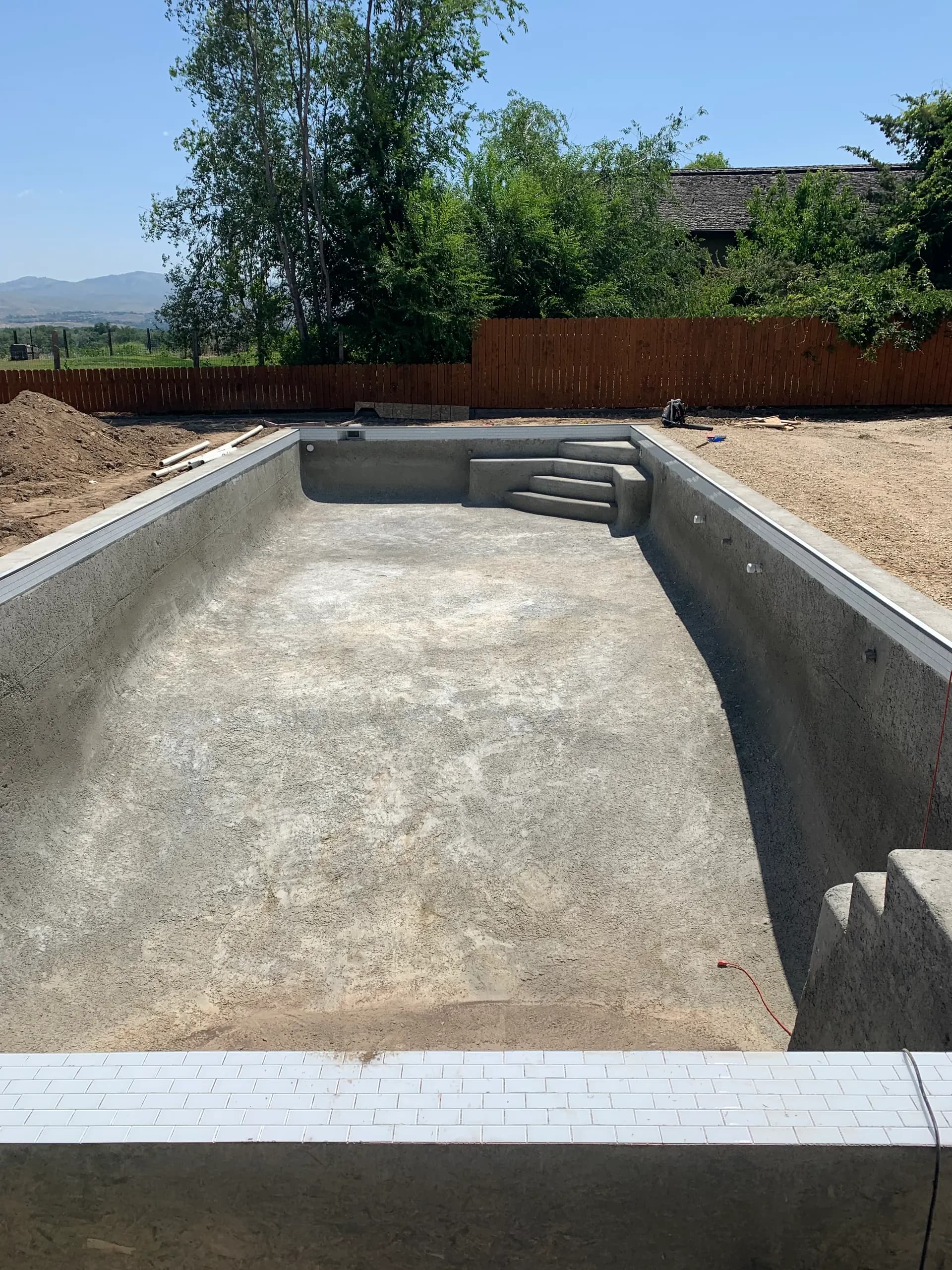 Gunite pool structure before plaster — HDT Custom Pool Builders Boise